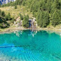 Beautiful alpine lake in the sun