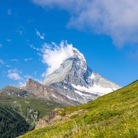 Matterhorn snowy summit in clouds viewed from the slopes above Zermatt