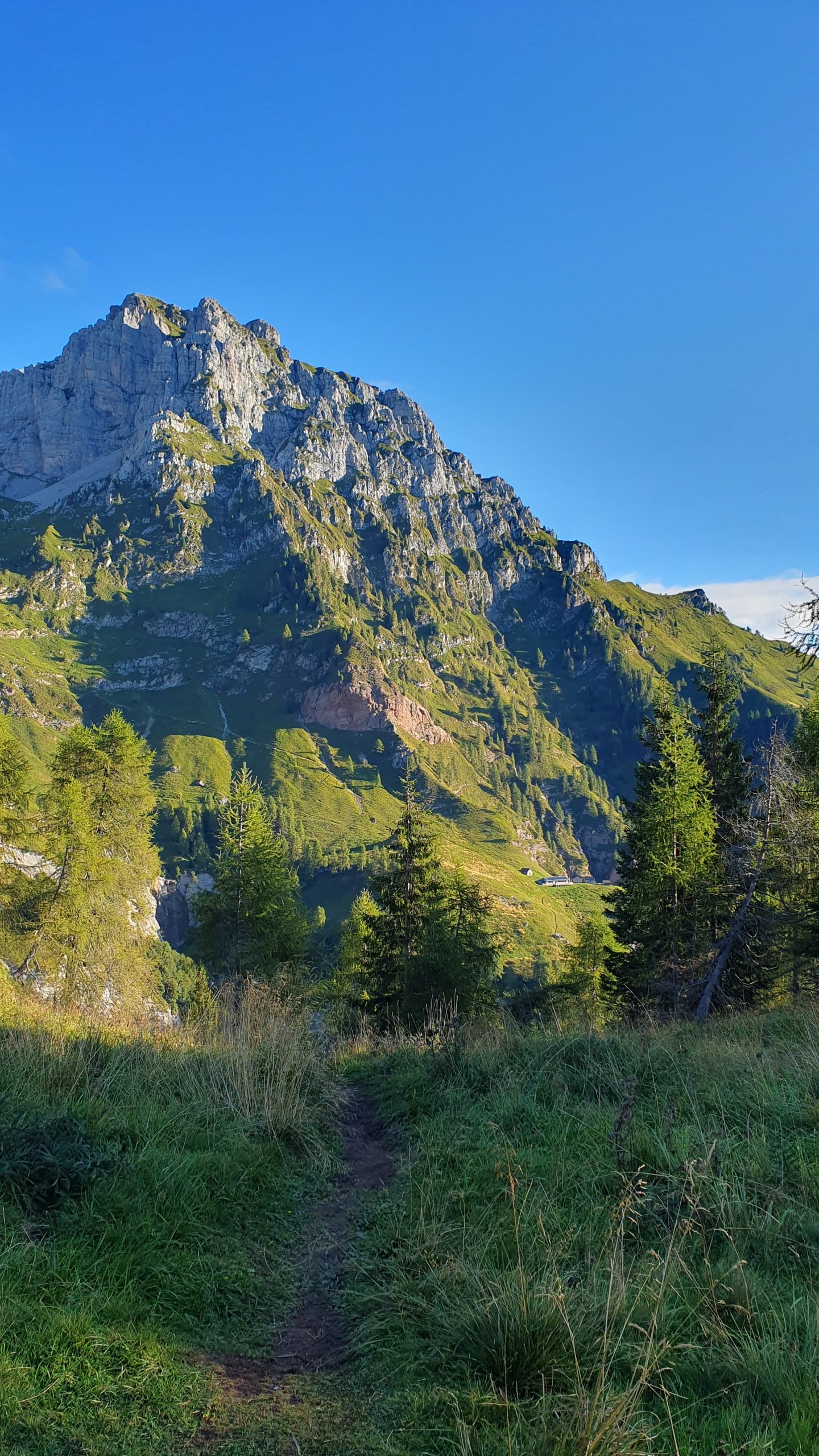 Rifugio Pian Fontana on a sunny morning on Alta Via 1 trek of the Italian Dolomites