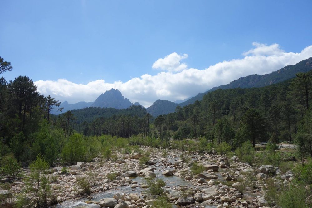 GR20 View of the Corsican mountain ranges from a dry river bed