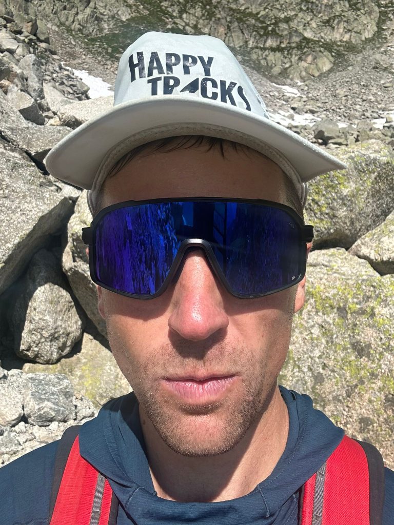 hiking in heat, Rich with snow in his hat
