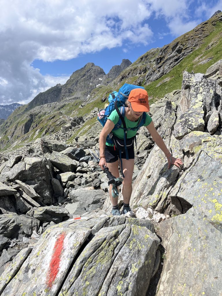 Helen crossing a boulder field